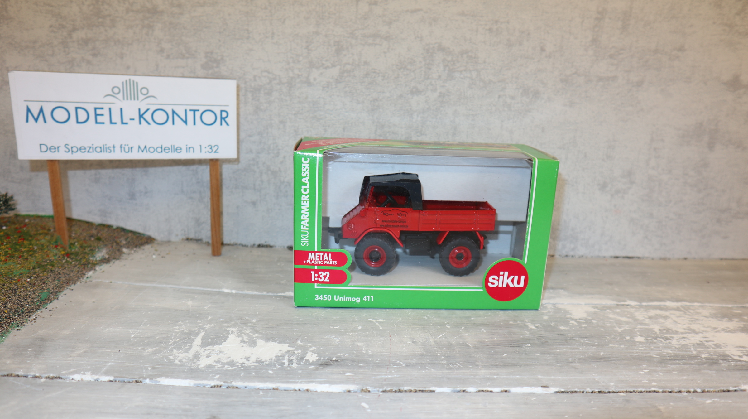 Siku 3450 in 1:32,  Unimog 411 rot Höing, NEU in OVP