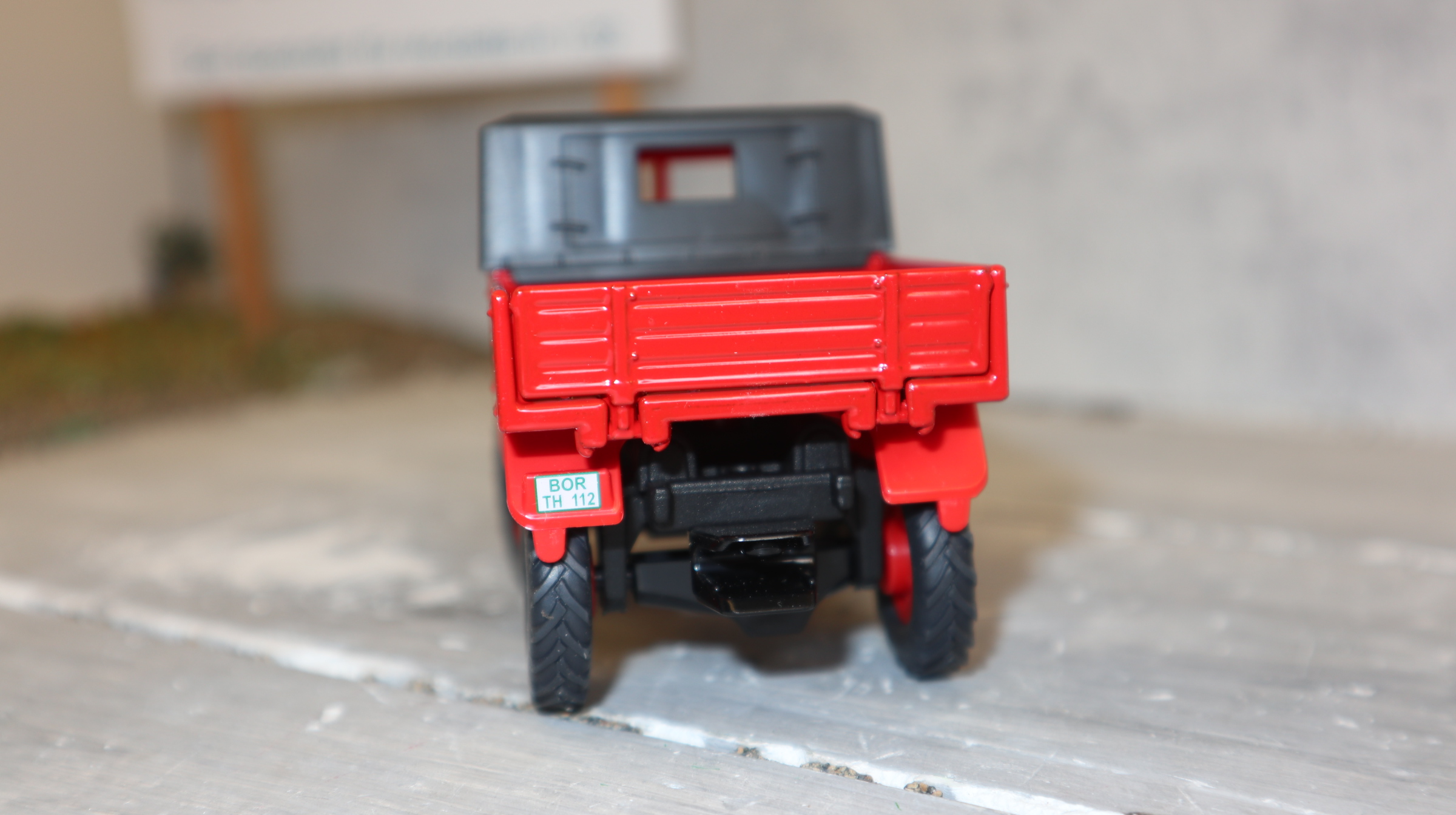 Siku 3450 in 1:32,  Unimog 411 rot Höing, NEU in OVP