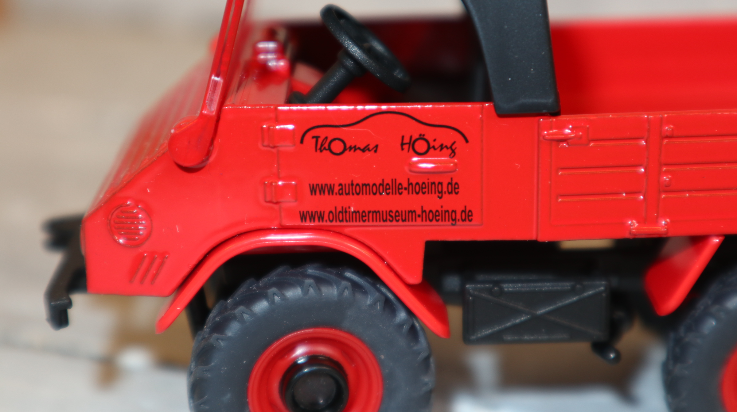 Siku 3450 in 1:32,  Unimog 411 rot Höing, NEU in OVP