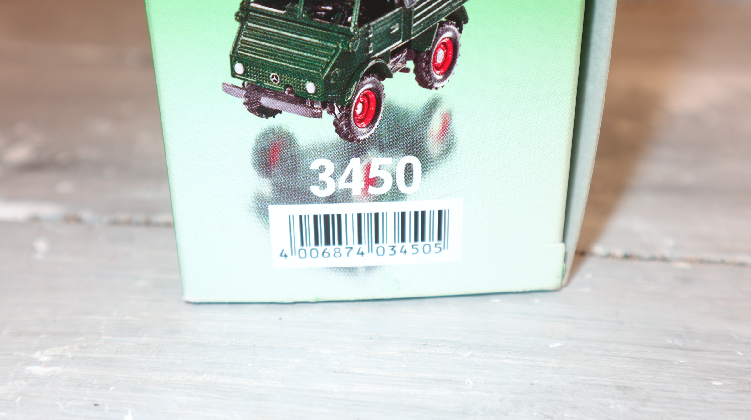 Siku 3450 in 1:32,  Unimog 411 rot Höing, NEU in OVP