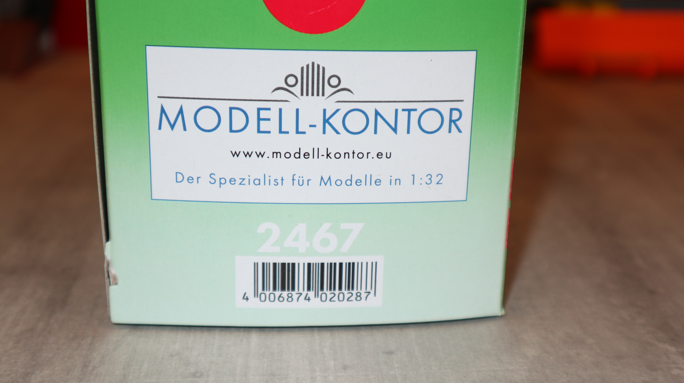 Siku 2467 in 1:32,  HOLARAS in Claas-grün, Maisschiebeschild MODELL-KONTOR 2026, NEU in OVP