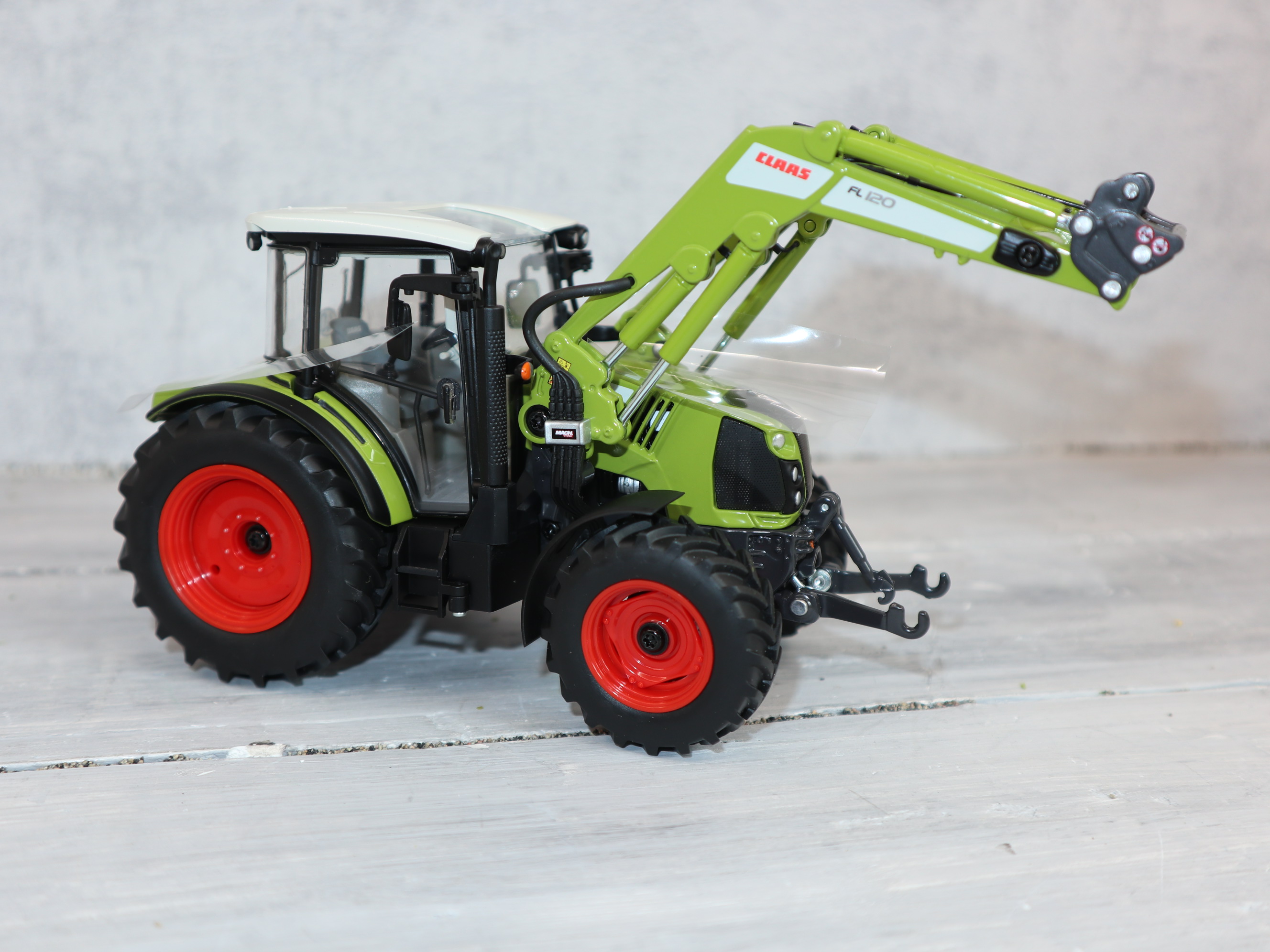 Wiking 0700010 1:32 Claas ARION 430 FL 120 mit wechselbarem Frontlader
