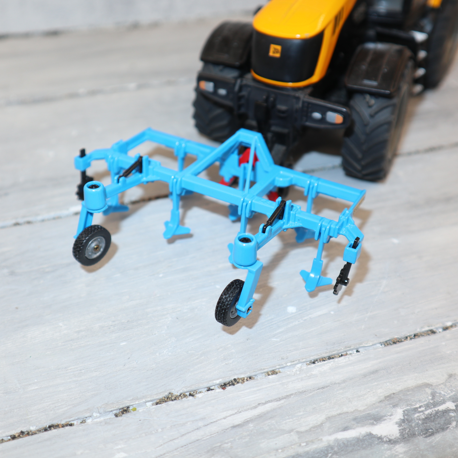 Siku 2061 in 1:32 Front-Grubber in hellblau NEU in OVP