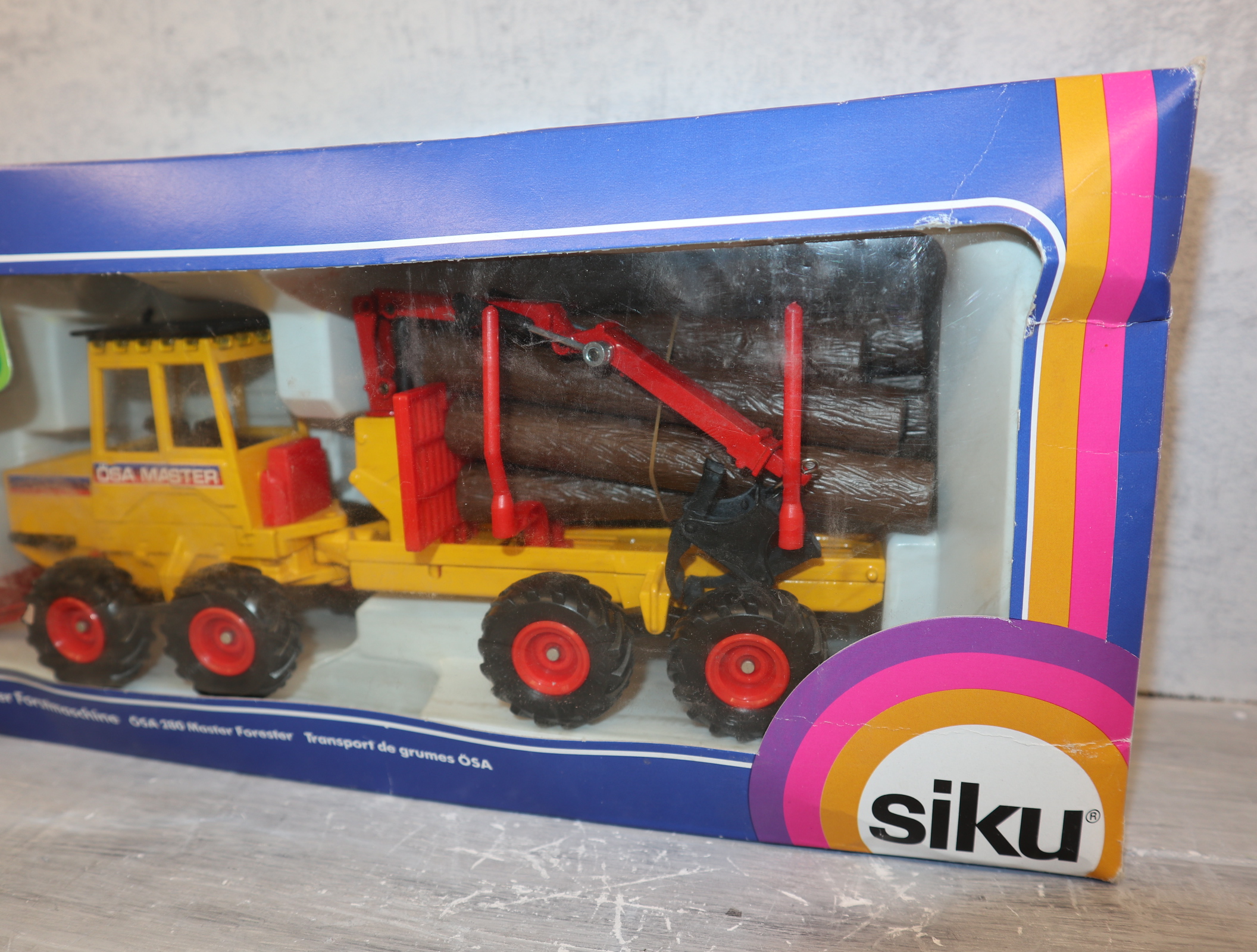 Siku 3952 in 1:32 ÖSA 280 Master Forstmaschine in gelb,  NEU in OVP