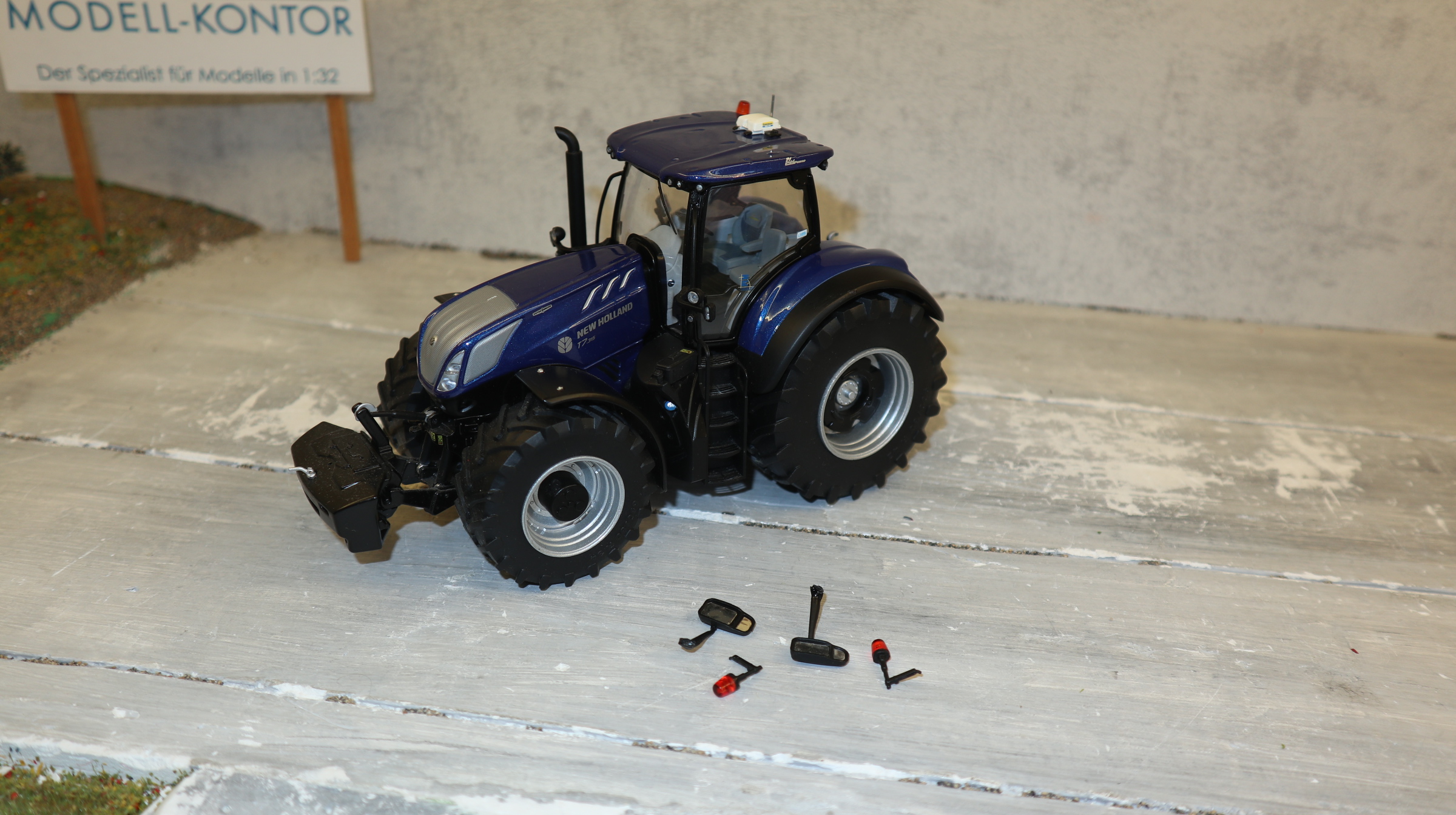 MarGe 2409 in 1:32, New Holland T7.315 blaumetalic, kleine Fehler, NEU ohne OVP