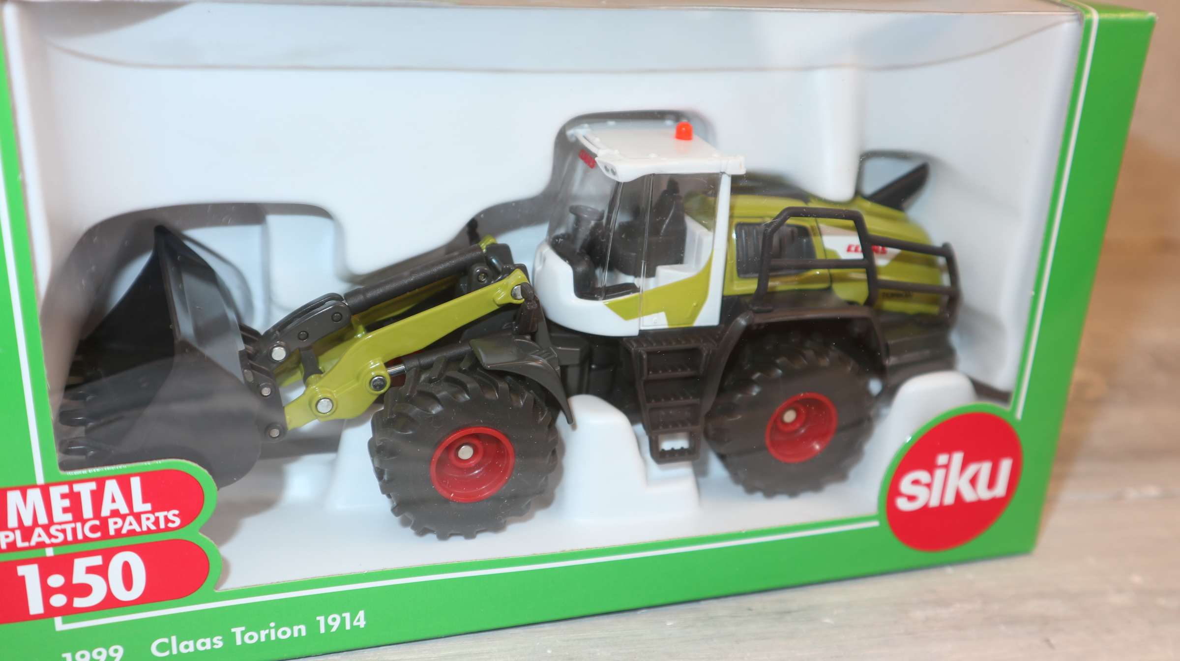 Siku 1999 in 1:50,  Claas Torion 1914 Radlader, NEU in OVP