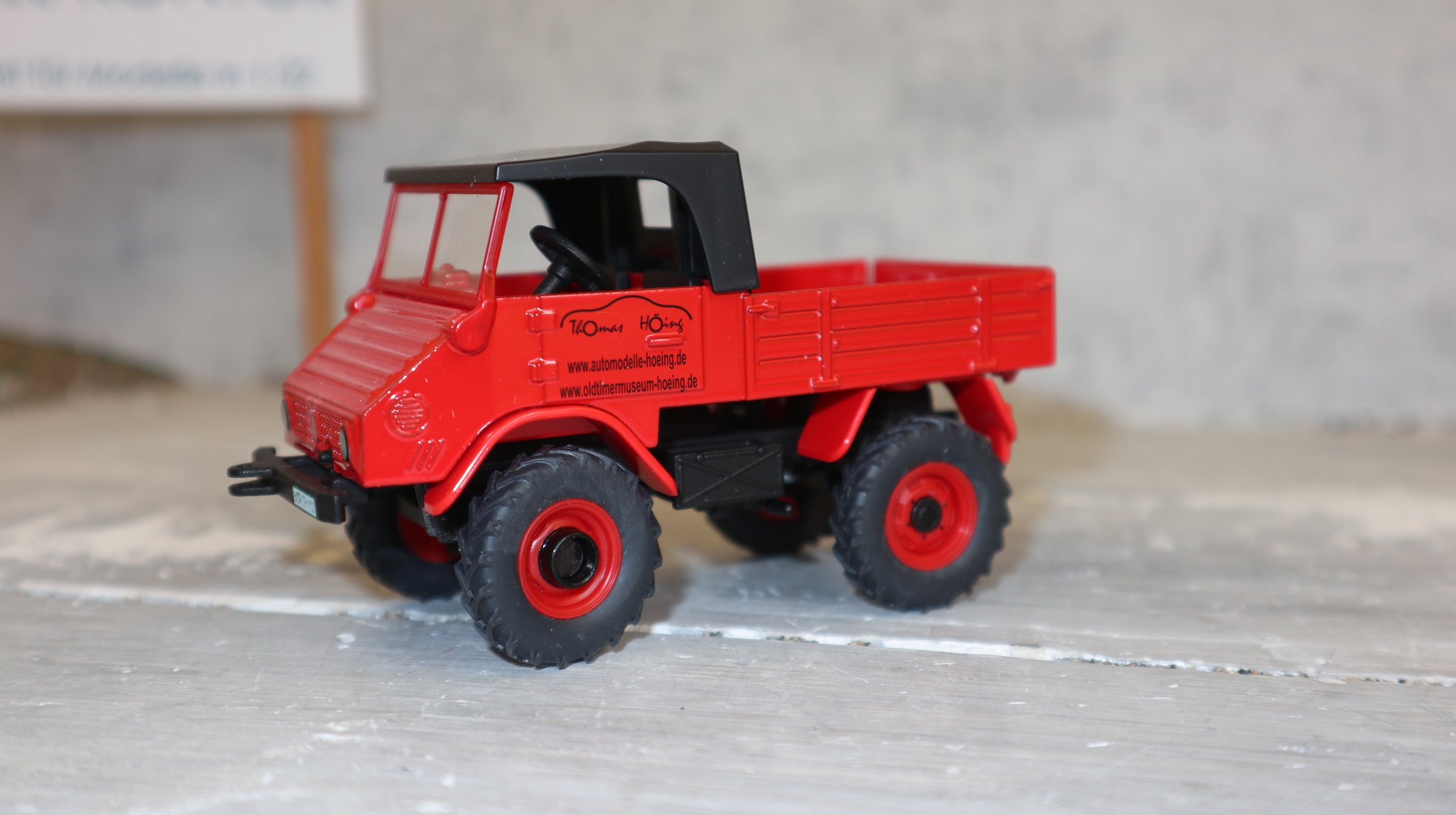 Siku 3450 in 1:32,  Unimog 411 rot Höing, NEU in OVP