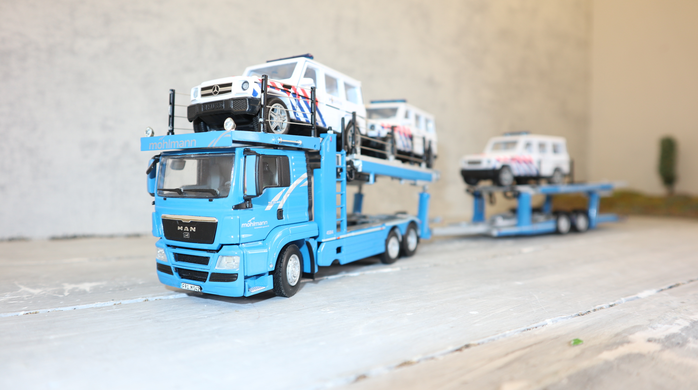WSI 02-2248 in 1:50, MAN TGS PKW-Transporter MÖHLMANN , Sondermodell 150x,  NEU in OVP