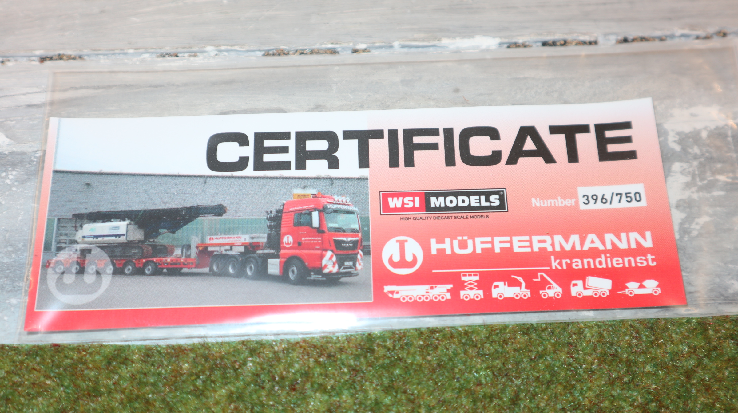 TEMA WSI 72-2062 in 1:87, Werbemodell Hüffermann 4-Achser mit 6-Achser Tiefbett, Neu in OVP